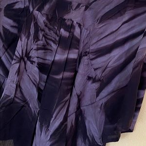 Contrast dark/light purple short sleeve shirt.